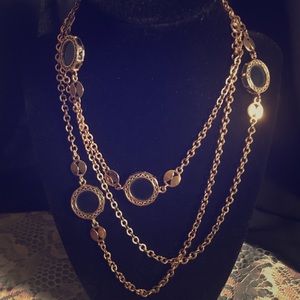 Gold toned, long,  flapper style necklace